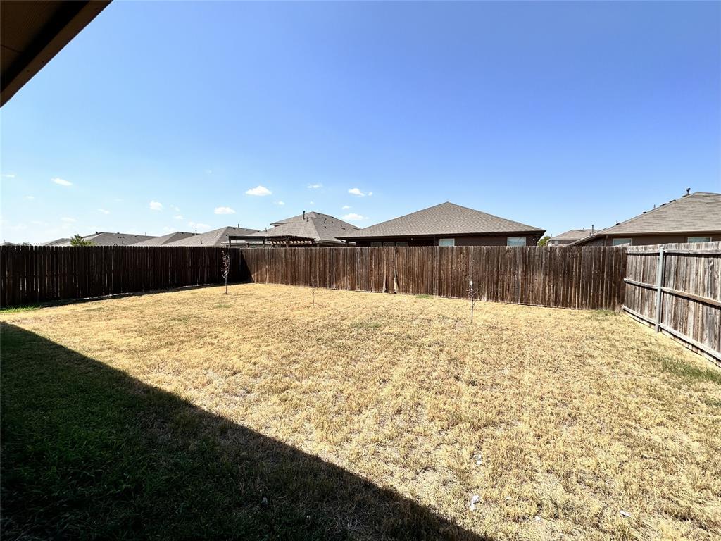 304 Cypress Crk Lane Denton, TX 76210 - Photo 21 of 24 a view of a backyard
