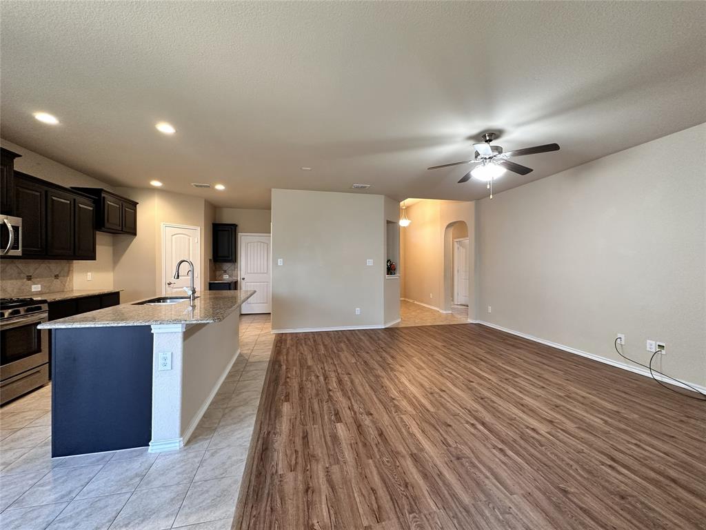 304 Cypress Crk Lane Denton, TX 76210 - Photo 24 of 24 a view of kitchen with sink and wooden floor