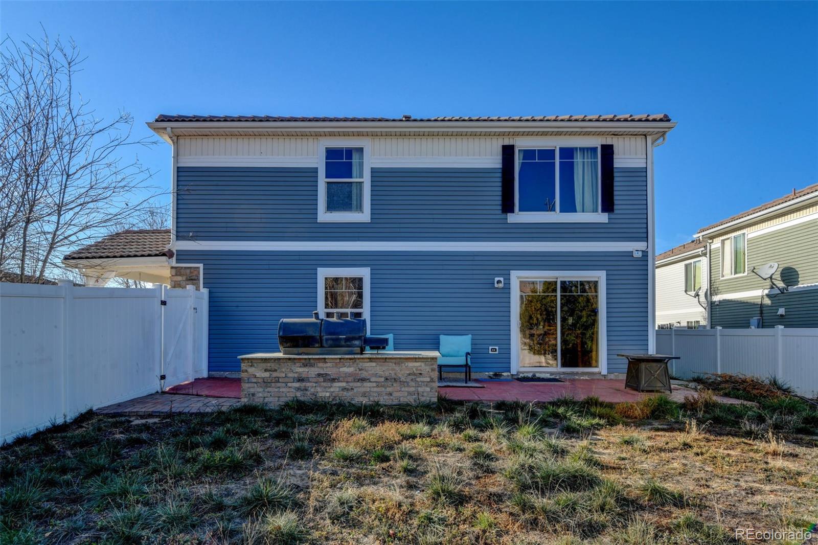 5555 Perth Court Denver, CO 80249 - Photo 28 of 31 a house view with a garden space