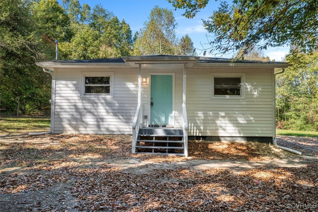 View of front of home featuring covered porch