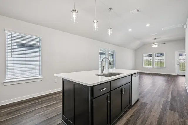 a view of a house with backyard and porch