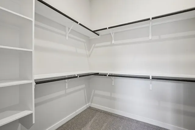 a bathroom with a sink double vanity and a mirror