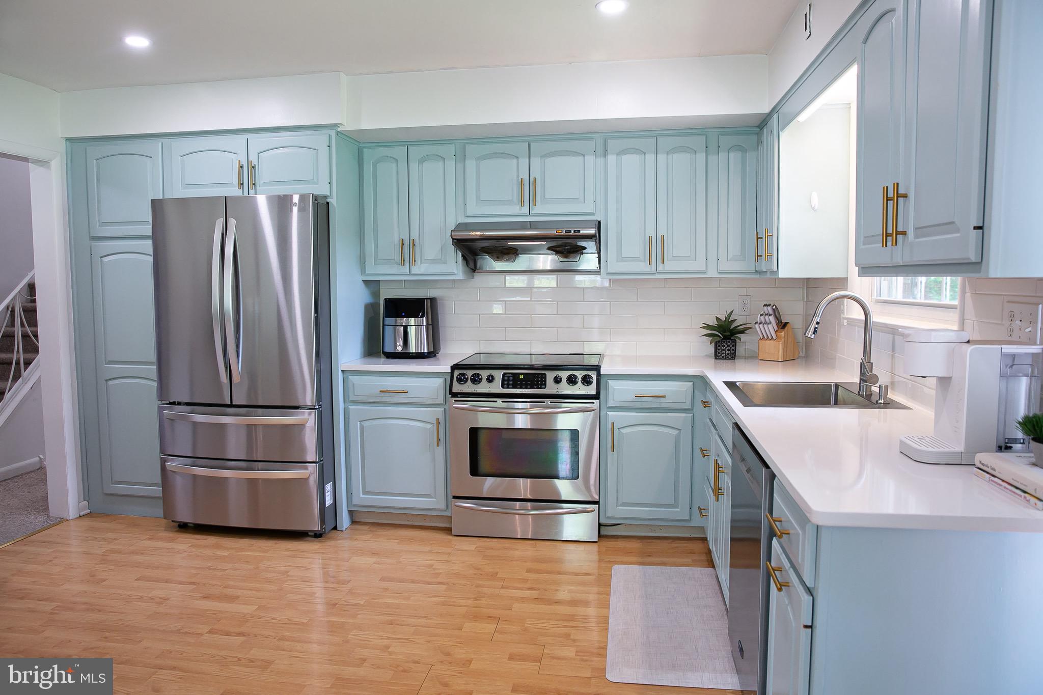 1395 Varnum Drive Wayne, PA 19087 - Photo 12 of 21 a kitchen with a sink and stainless steel appliances