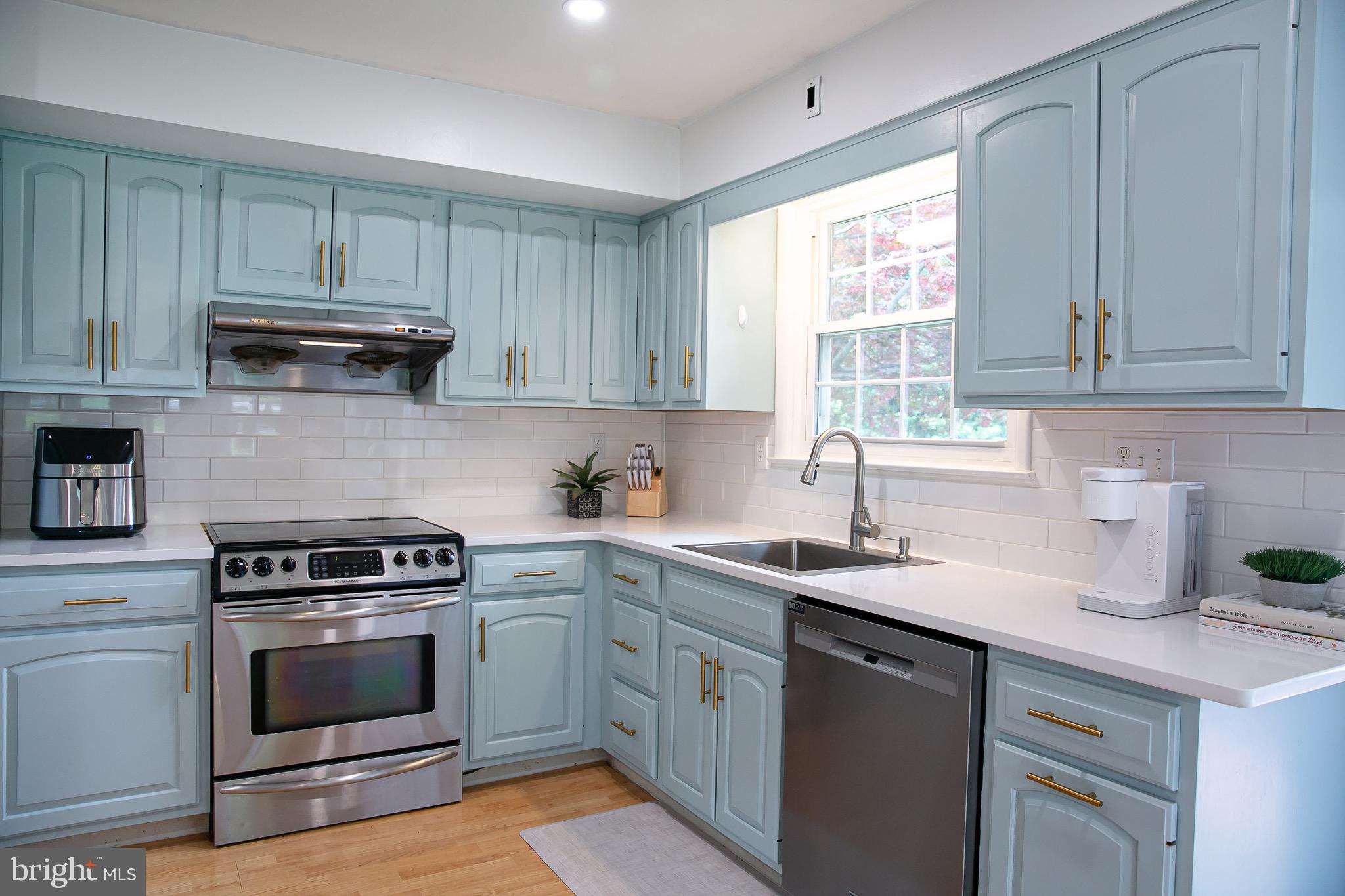 1395 Varnum Drive Wayne, PA 19087 - Photo 13 of 21 a kitchen with cabinets appliances a sink and a window