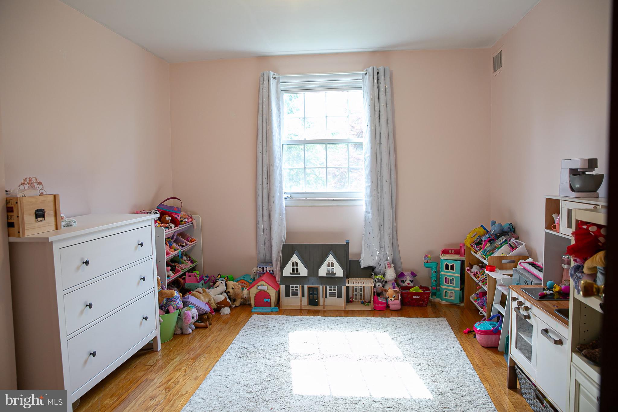 1395 Varnum Drive Wayne, PA 19087 - Photo 18 of 21 a room with lots of baby toys and wooden floor