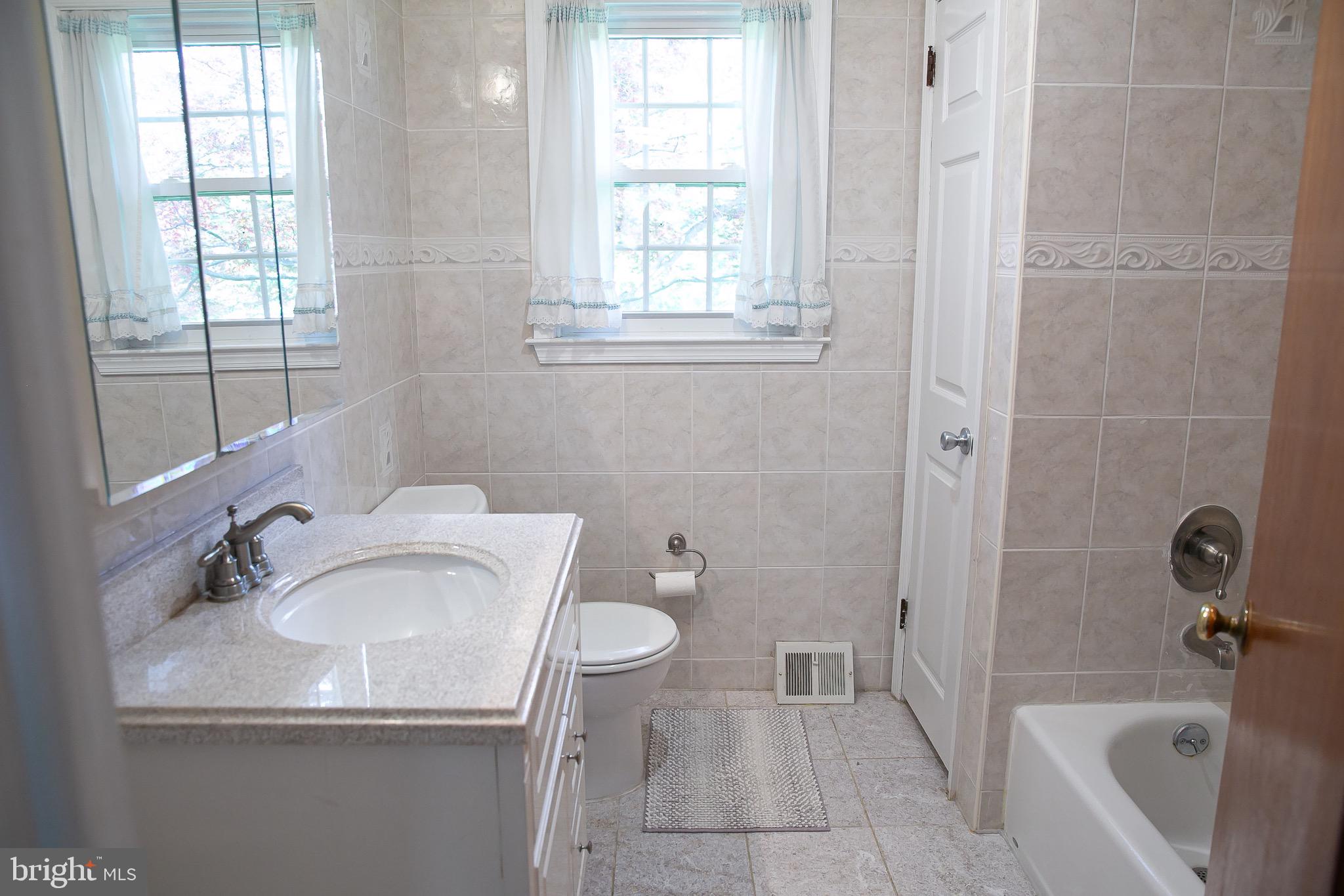 1395 Varnum Drive Wayne, PA 19087 - Photo 19 of 21 a bathroom with a sink toilet and shower