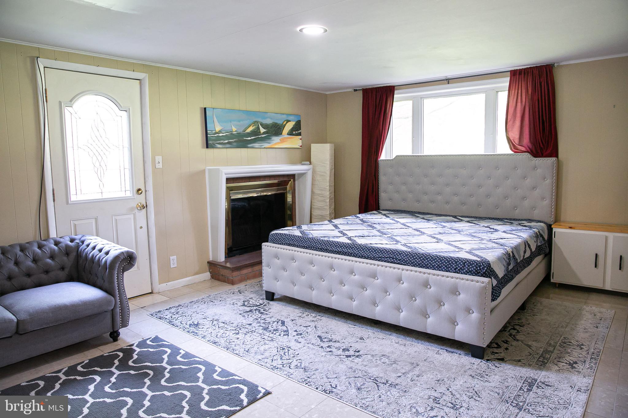 1395 Varnum Drive Wayne, PA 19087 - Photo 20 of 21 a bedroom with a bed and a couch