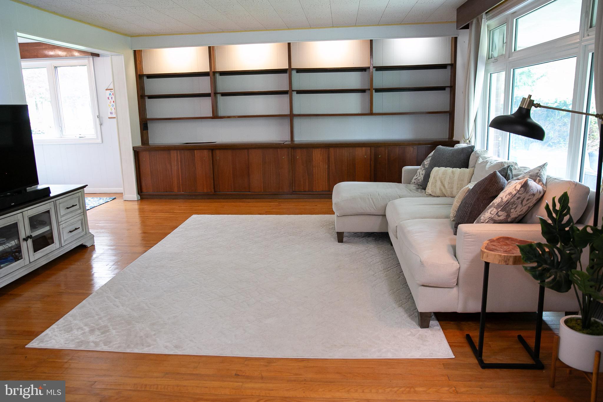 1395 Varnum Drive Wayne, PA 19087 - Photo 6 of 21 a living room with furniture and a flat screen tv