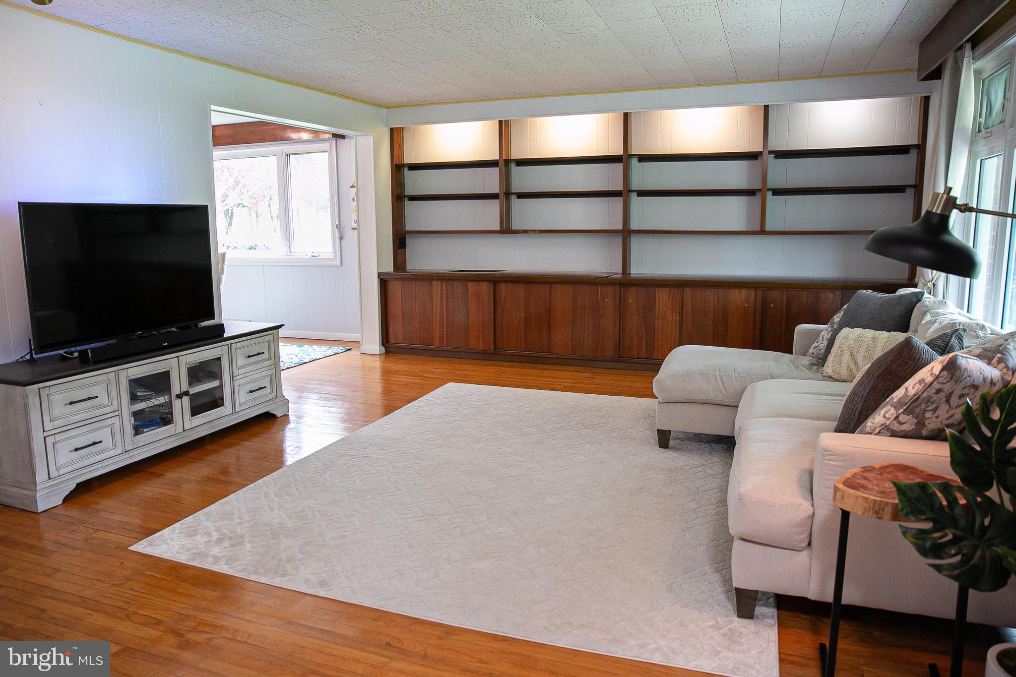 1395 Varnum Drive Wayne, PA 19087 - Photo 7 of 21 a living room with furniture and a flat screen tv