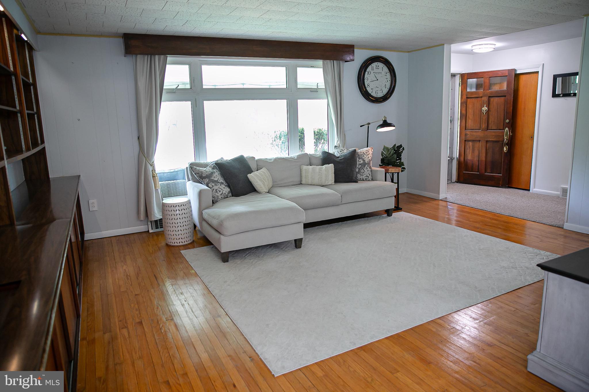 1395 Varnum Drive Wayne, PA 19087 - Photo 8 of 21 a living room with furniture and a large window