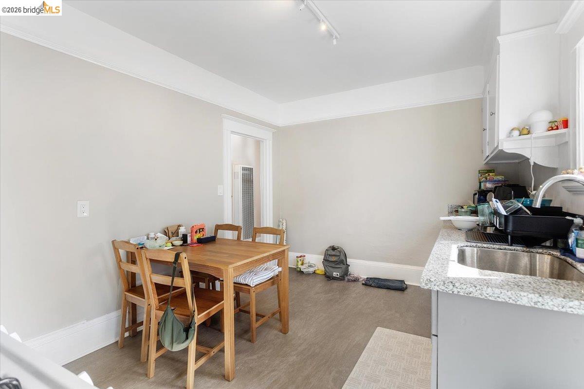 3110 California Street Berkeley, CA 94703 - Photo 19 of 41 Dining room with rail lighting, light wood-type flooring, and a heating unit