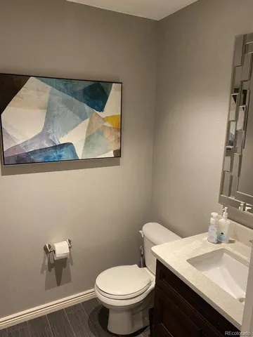 a bathroom with a sink and a toilet