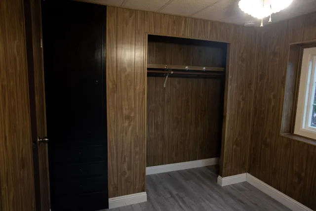 a view of empty room with windows