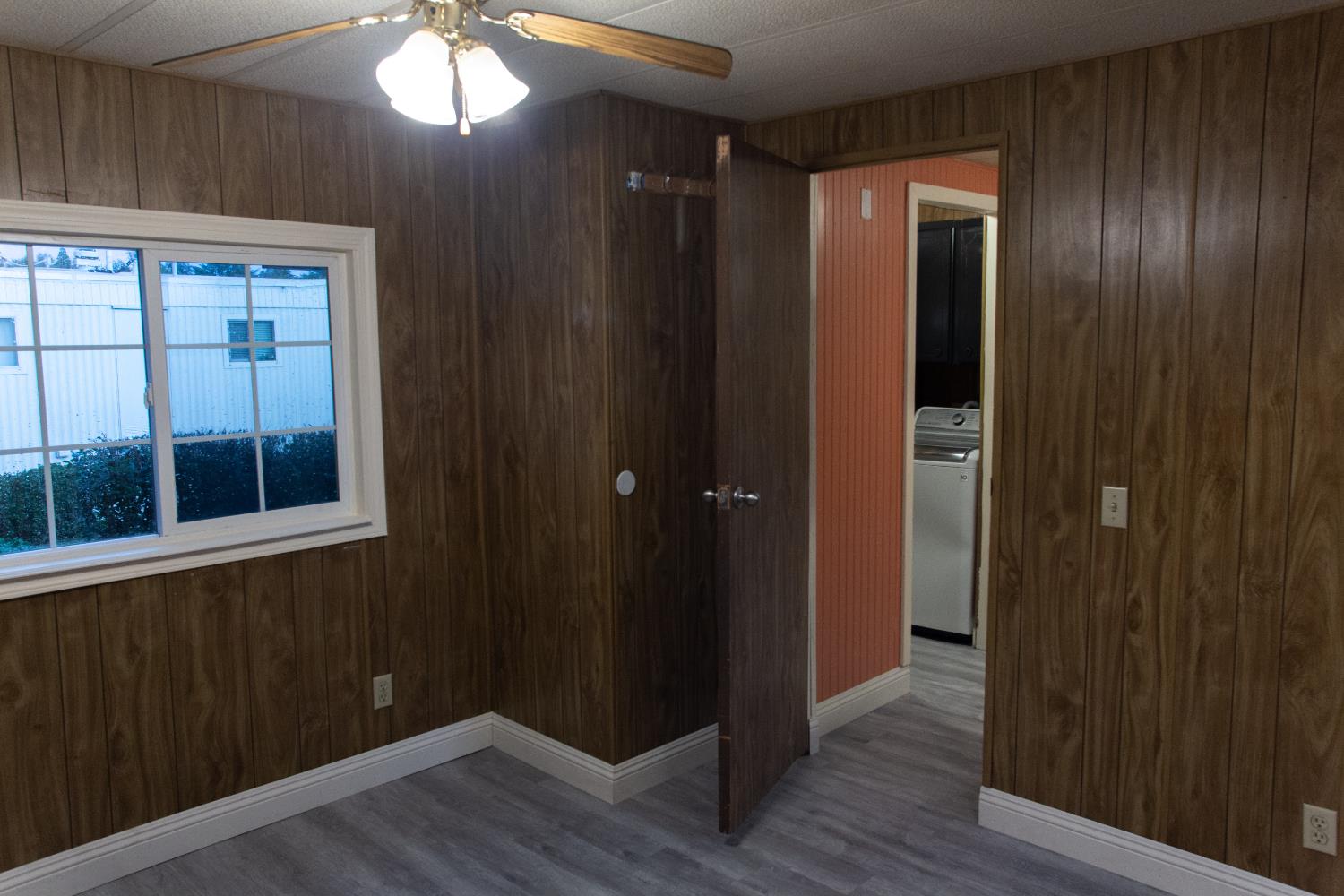 350 Pleasant Valley Road, Unit 8 Diamond Springs, CA 95619 - Photo 18 of 26 wooden floor in an empty room with a window