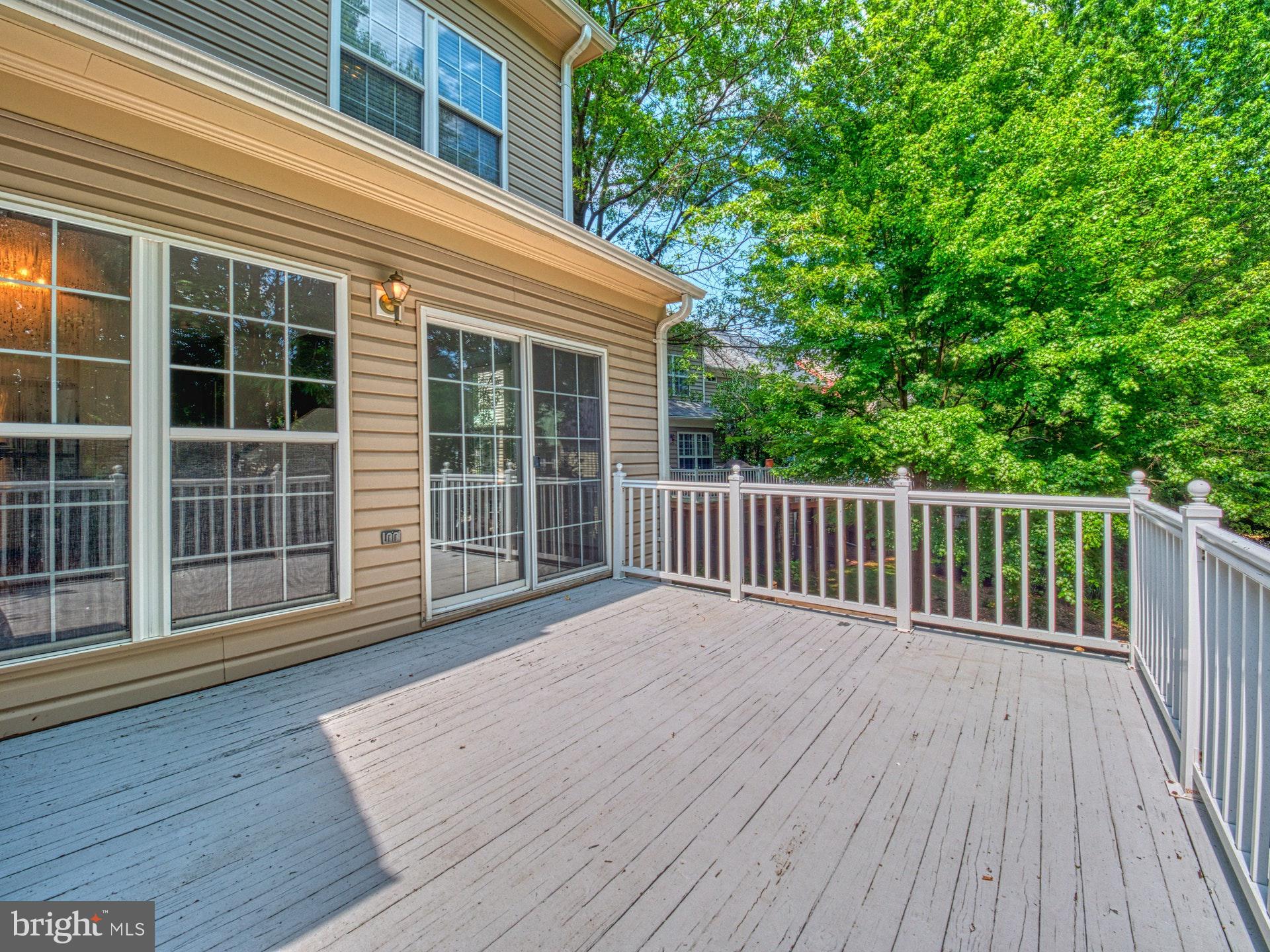 11451 Heritage Commons Way Reston, VA 20194 - Photo 17 of 23 SUNNY DECK OVERLOOKING TREES + SONGBIRDS