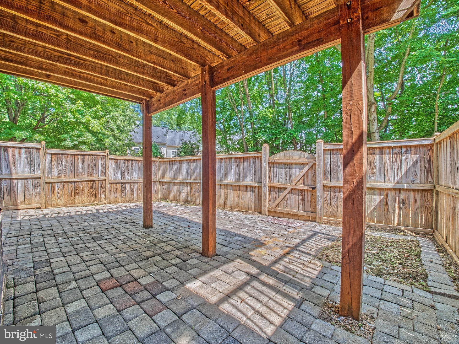 11451 Heritage Commons Way Reston, VA 20194 - Photo 18 of 23 PRIVATE PATIO IN EXTRA LARGE FENCED BACKYARD