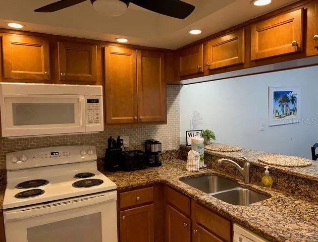 a bedroom with bed and window