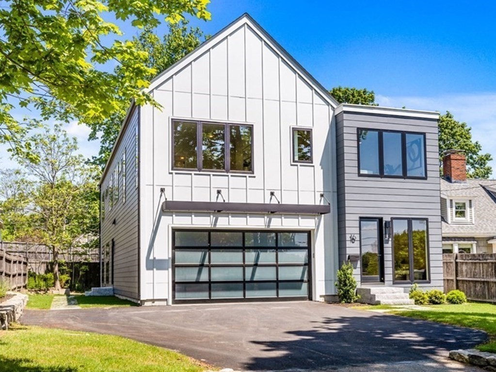 a front view of a house with a porch