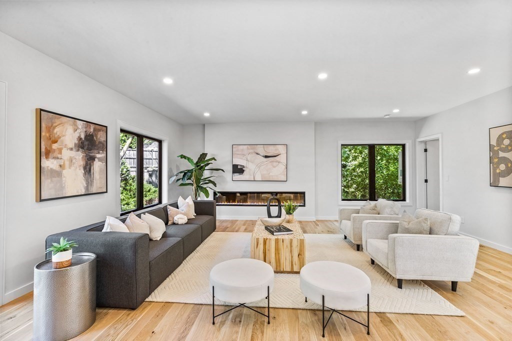 16 Eldridge Court Hingham, MA 02043 - Photo 12 of 41 a living room with furniture and a large window
