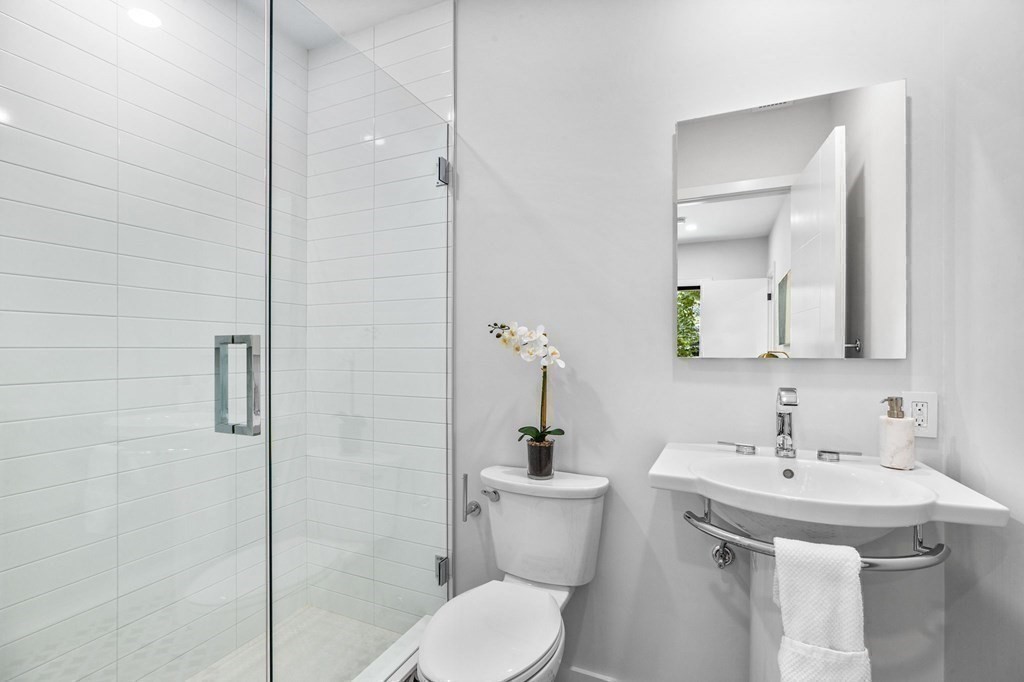 16 Eldridge Court Hingham, MA 02043 - Photo 18 of 41 a bathroom with a sink toilet and shower