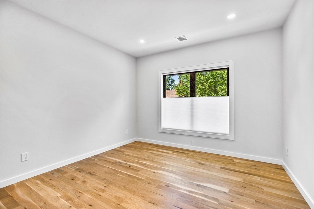 16 Eldridge Court Hingham, MA 02043 - Photo 32 of 41 an empty room with a window