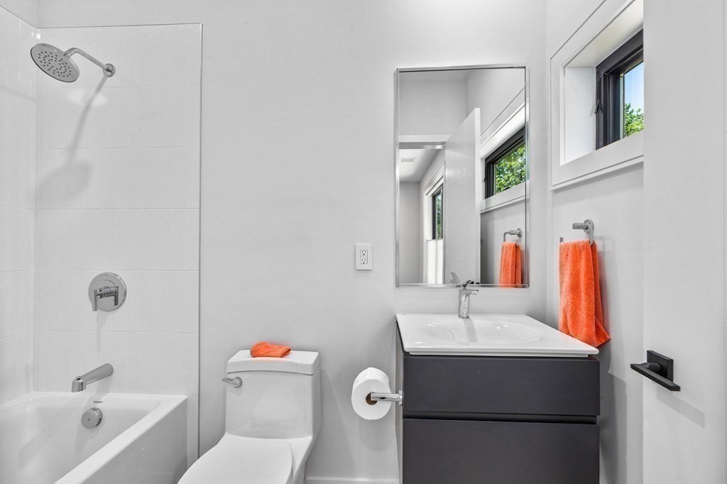 16 Eldridge Court Hingham, MA 02043 - Photo 37 of 41 a bathroom with a sink toilet and shower