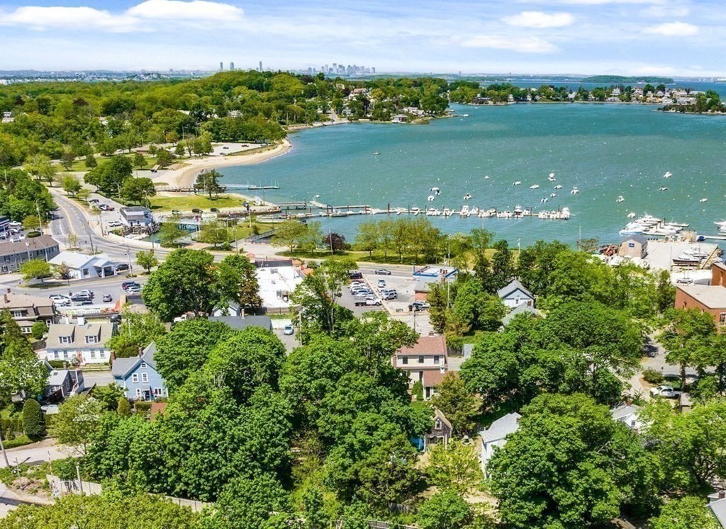 16 Eldridge Court Hingham, MA 02043 - Photo 38 of 41 a view of a lake with a city