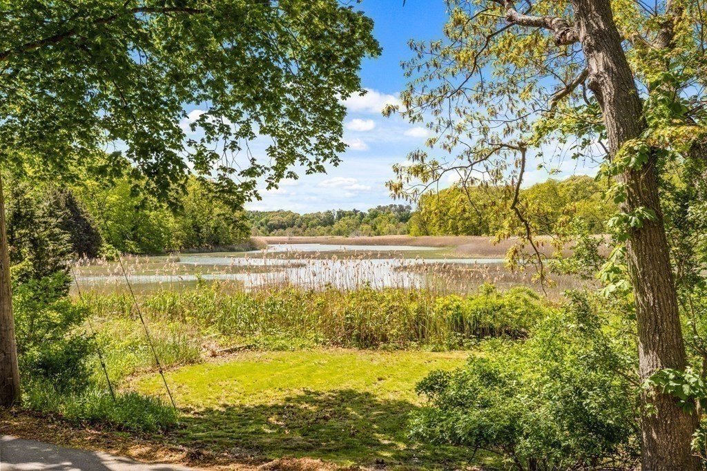 16 Eldridge Court Hingham, MA 02043 - Photo 40 of 41 a view of a lake with a yard