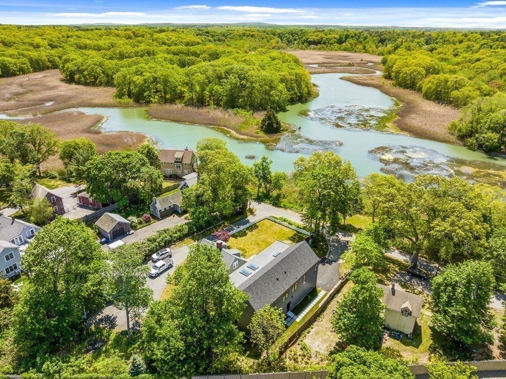 16 Eldridge Court Hingham, MA 02043 - Photo 41 of 41 a view of a lake with a house