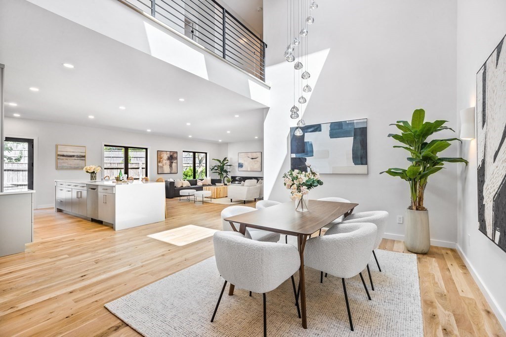 16 Eldridge Court Hingham, MA 02043 - Photo 6 of 41 a dining room with furniture a livingroom and chandelier