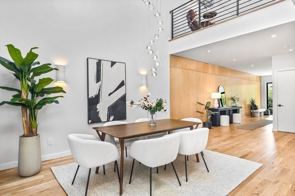 16 Eldridge Court Hingham, MA 02043 - Photo 8 of 41 a view of a dining room with furniture and wooden floor