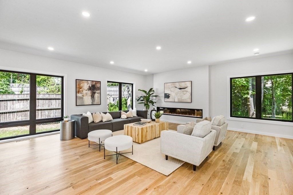 16 Eldridge Court Hingham, MA 02043 - Photo 9 of 41 a living room with furniture and large windows