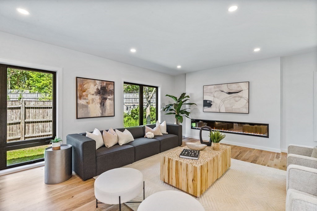 16 Eldridge Court Hingham, MA 02043 - Photo 10 of 41 a living room with furniture and a large window