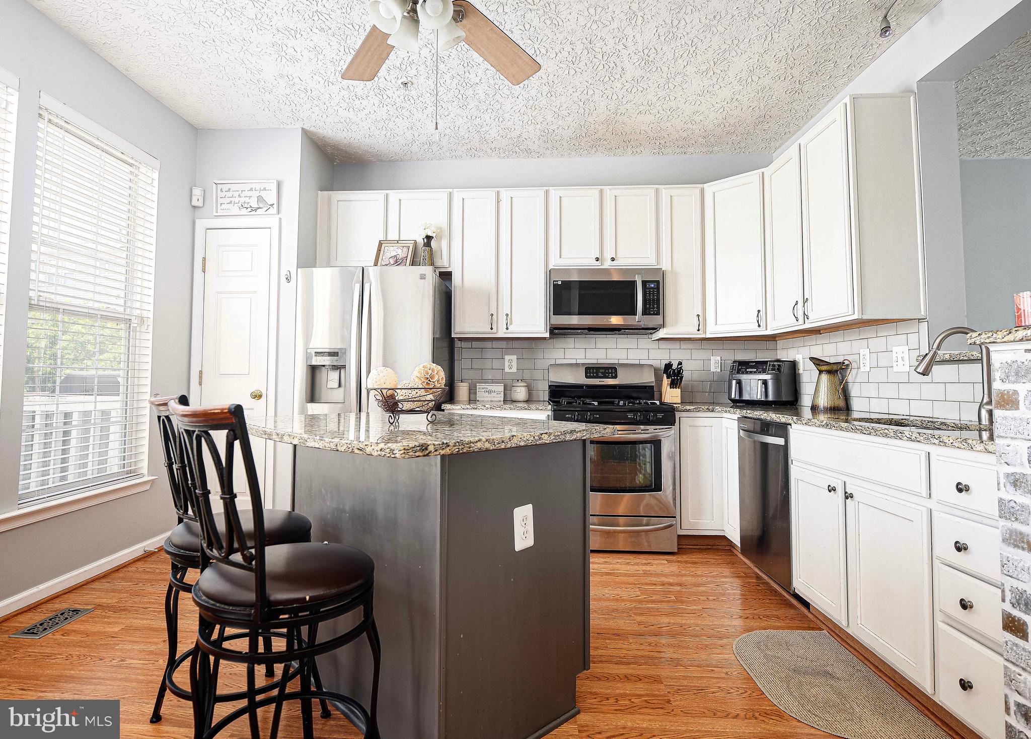 9736 Morningview Circle Perry Hall, MD 21128 - Photo 16 of 33 Hardwood throughout the kitchen
