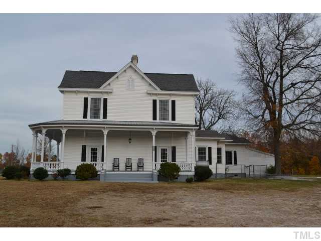 3785 Dabney Road Henderson, NC 27537 - Photo 13 of 13 a front view of a house with a yard