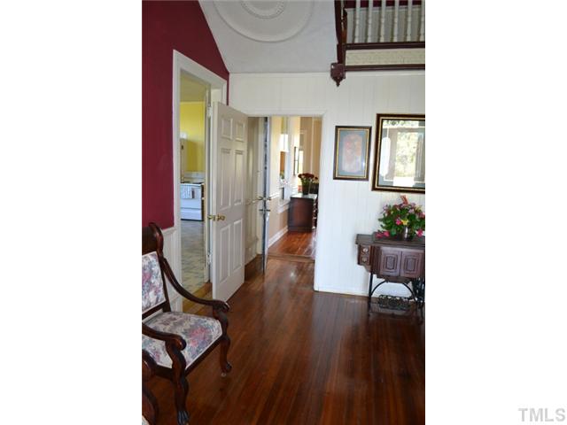3785 Dabney Road Henderson, NC 27537 - Photo 5 of 13 a view of a livingroom with furniture and staircase
