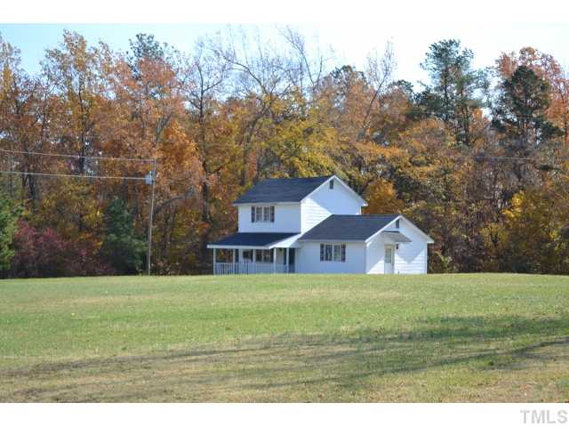 3785 Dabney Road Henderson, NC 27537 - Photo 8 of 13 a view of a house with a yard