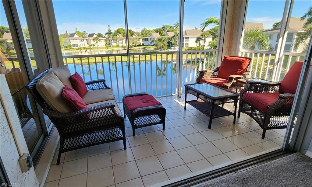 75 Georgetown Boulevard, Unit 75 Naples, FL 34112 - Photo 11 of 28 Screened Lania with a water view