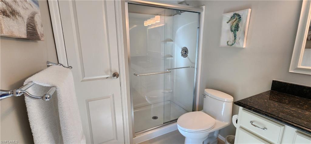75 Georgetown Boulevard, Unit 75 Naples, FL 34112 - Photo 14 of 28 New White bathroom