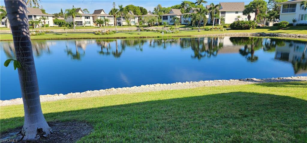 75 Georgetown Boulevard, Unit 75 Naples, FL 34112 - Photo 21 of 28 View of water feature