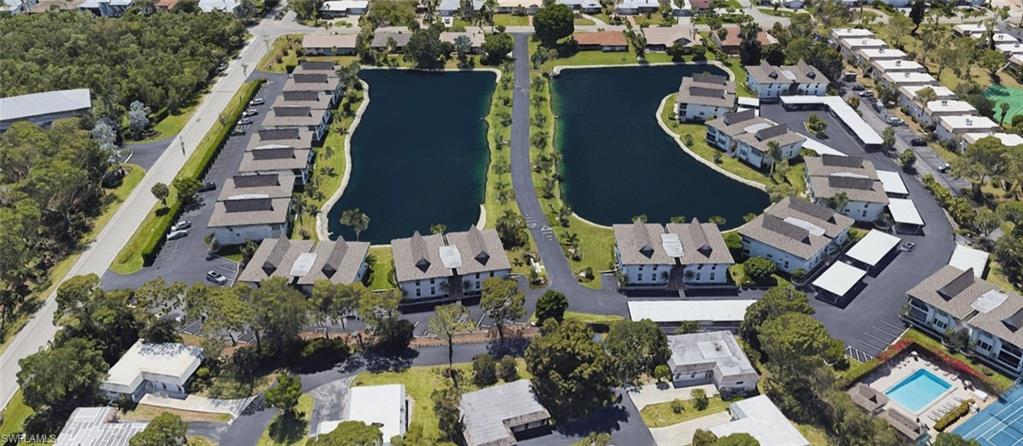 75 Georgetown Boulevard, Unit 75 Naples, FL 34112 - Photo 28 of 28 Aerial view with a water view