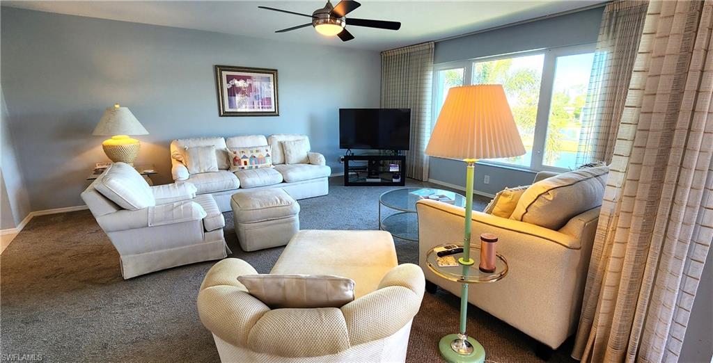 75 Georgetown Boulevard, Unit 75 Naples, FL 34112 - Photo 3 of 28 Living room stunning view