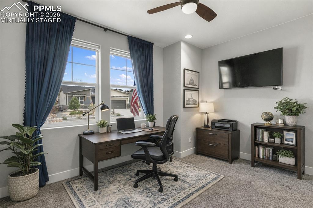 2131 Seaglass Street Colorado Springs, CO 80921 - Photo 22 of 41 Main level guest bedroom or office Virtually Staged