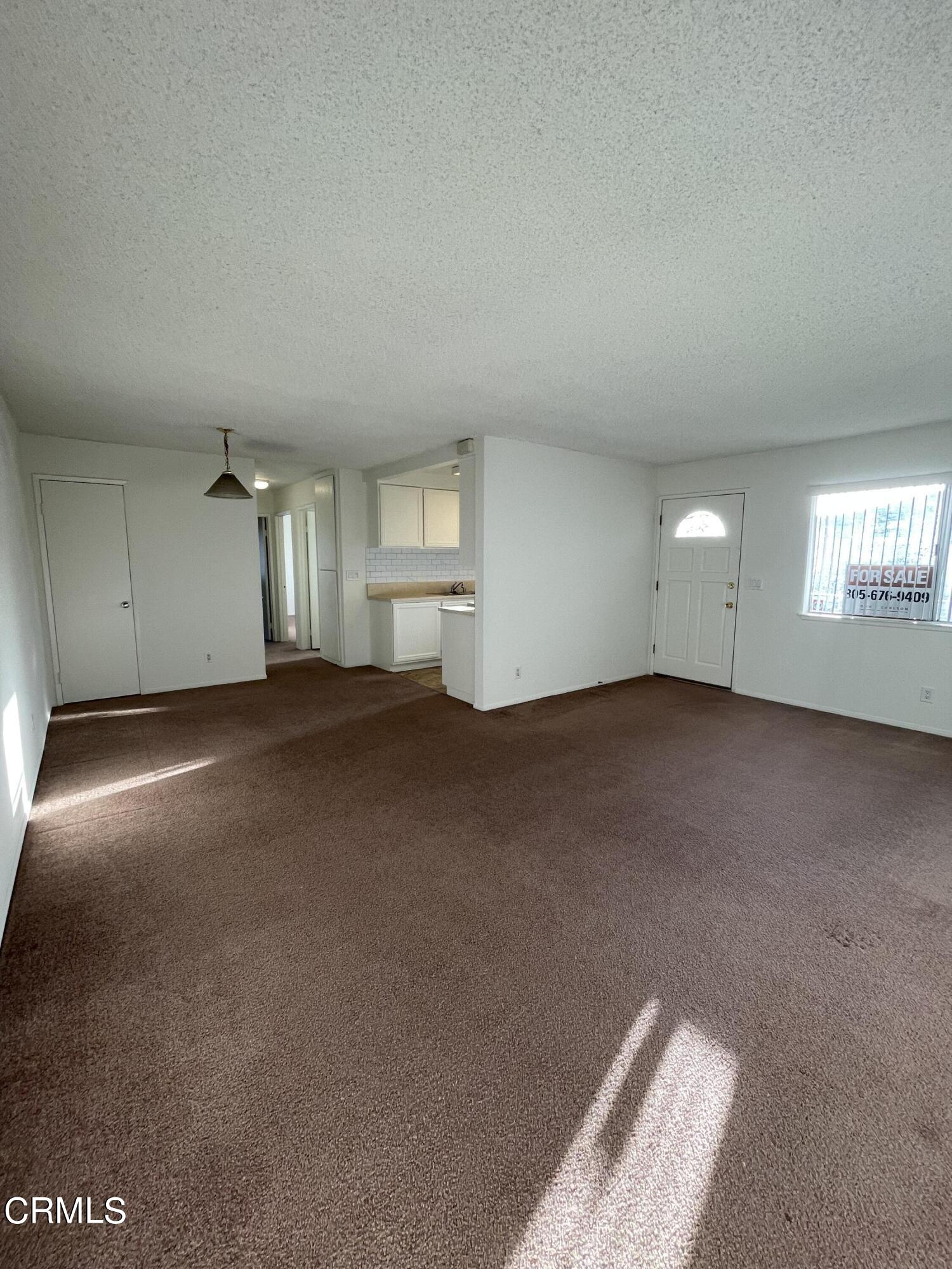 1103 Bryce Way Ventura, CA 93003 - Photo 1 of 8 a view of a livingroom and a window