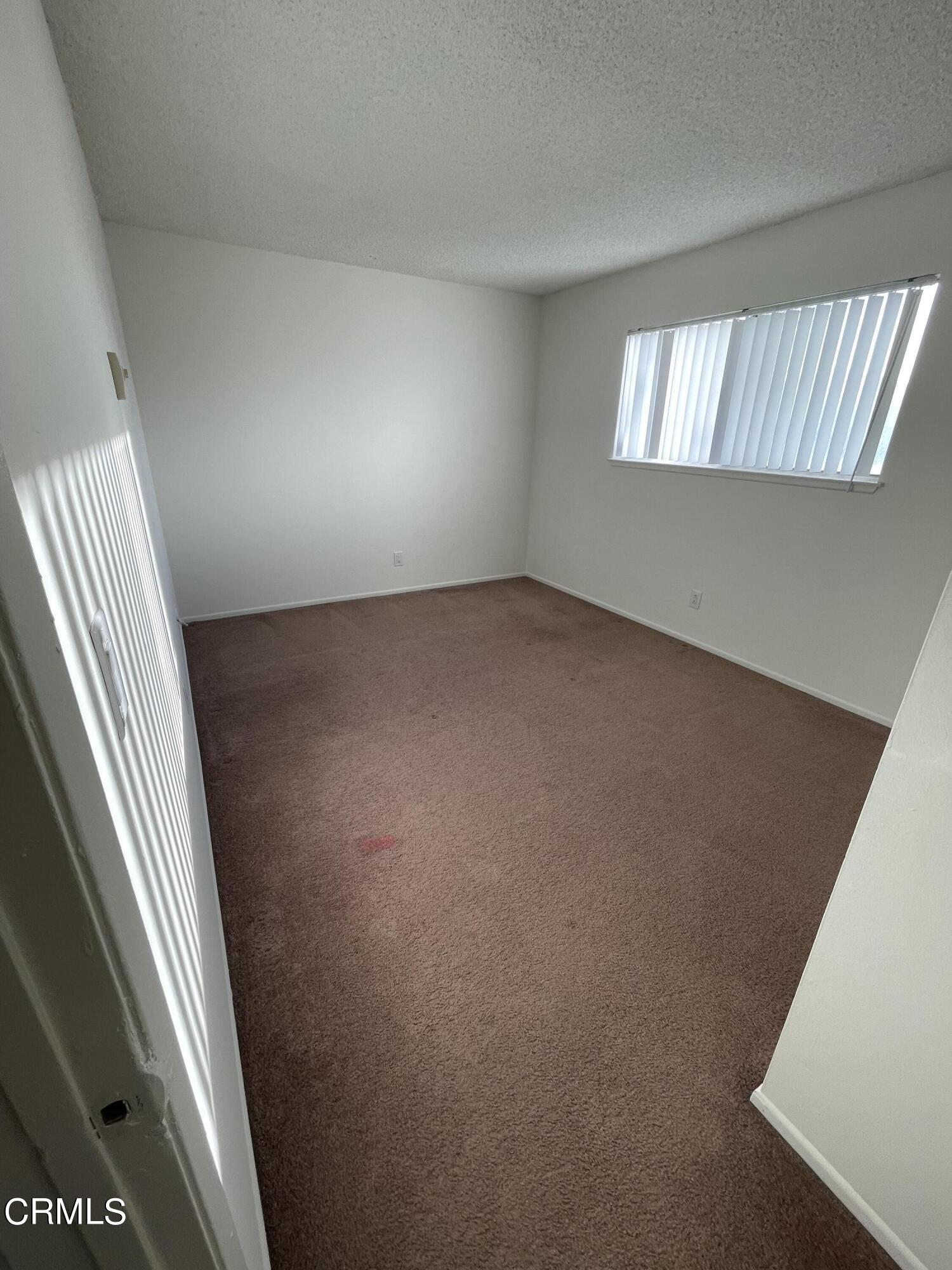 1103 Bryce Way Ventura, CA 93003 - Photo 6 of 8 a view of an empty room and window