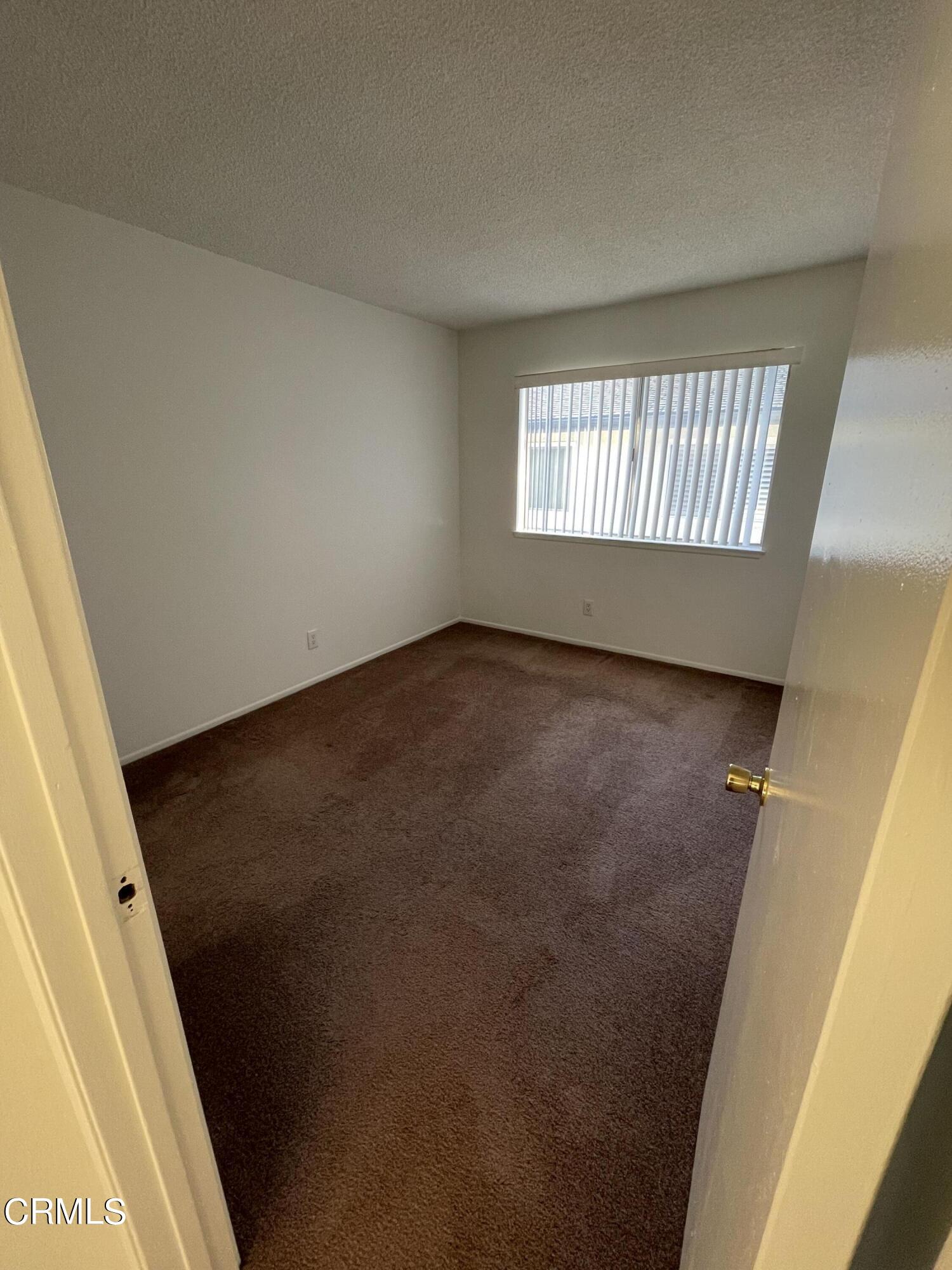 1103 Bryce Way Ventura, CA 93003 - Photo 8 of 8 an empty room with windows