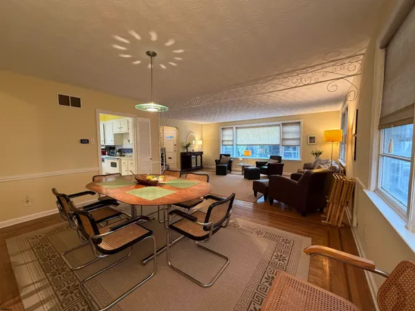 a view of a dining room with furniture