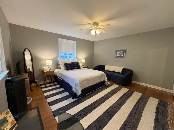 a kitchen with a sink appliances and cabinets