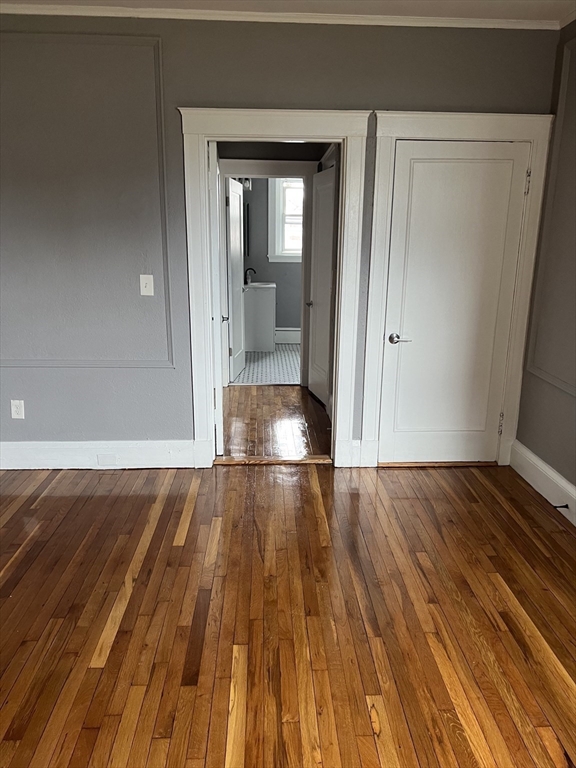 840 Massachusetts Avenue, Unit 8 Arlington, MA 02476 - Photo 3 of 8 a view of entryway with wooden floor