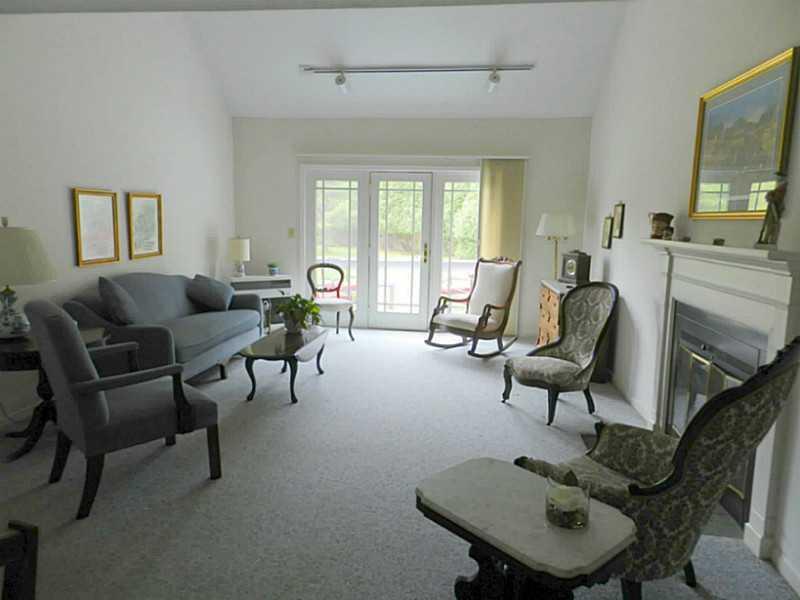5 Wonderbrook Drive, Unit 5 Kennebunk, ME 04043 - Photo 12 of 25 Living Room.